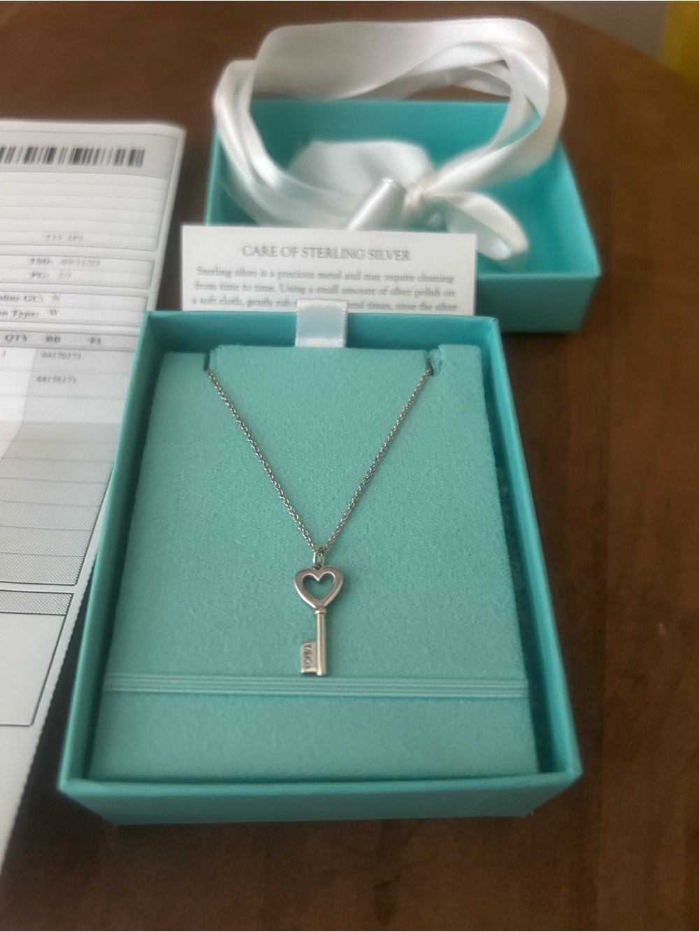 Tiffany & Co. Sterling Silver Heart Key Necklace.